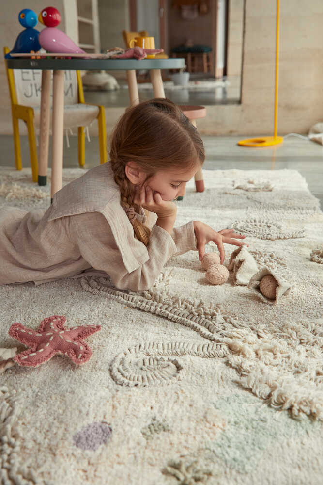 Lorena Canals Seabed Washable Play Rug with shell starfish and pompom accessories
