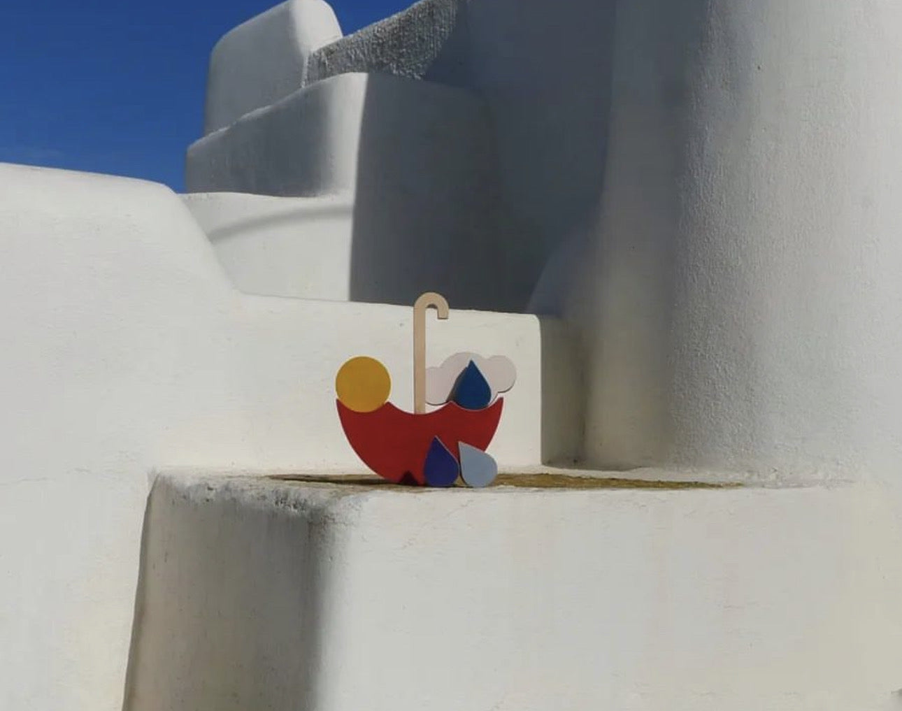 The red umbrella stacking and balance toy