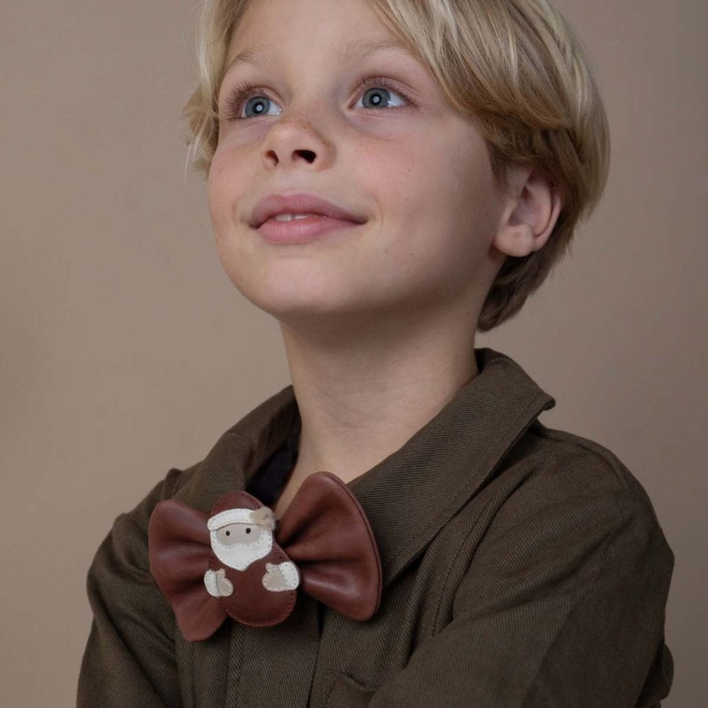 Donsje Jery Santa bow tie worn with a jacket