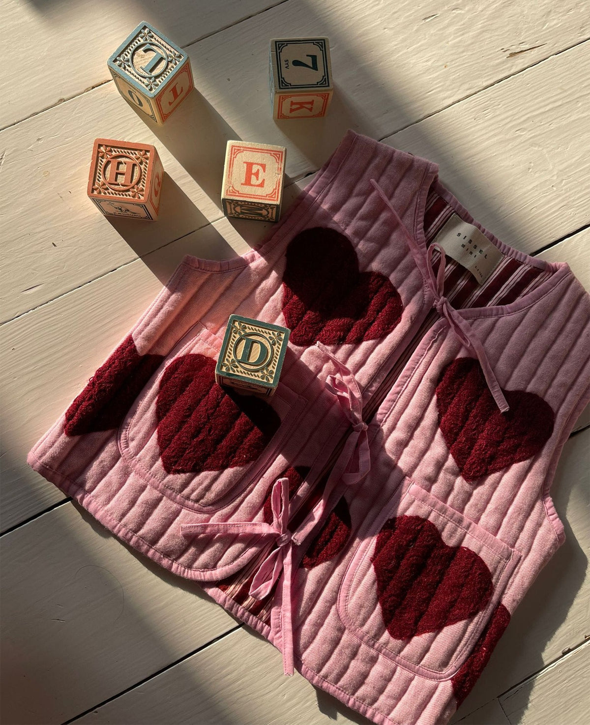 Honey MINI Vest - Burgundy Hearts – official product image 1