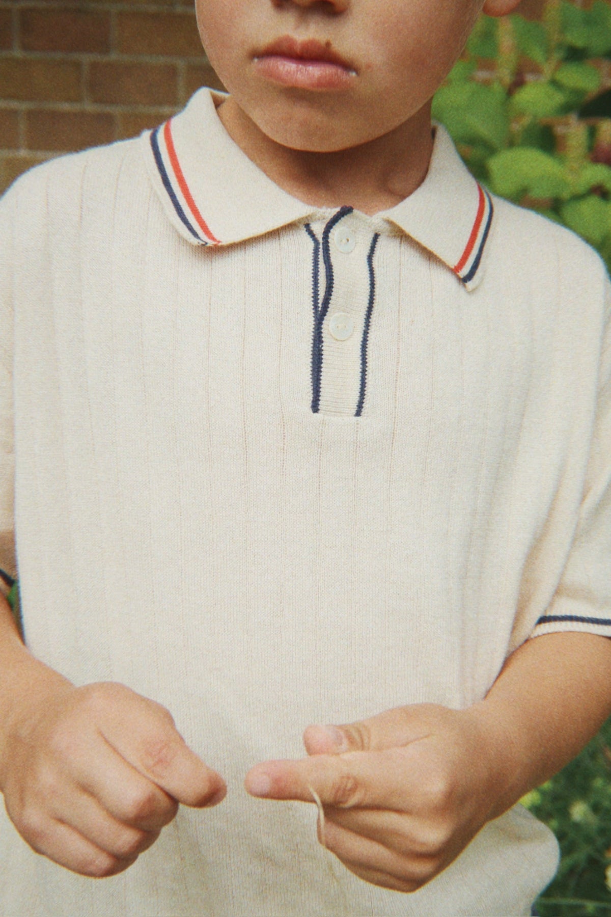 Konges Sløjd Mio Knit Polo in Almond Milk, lifestyle view 3
