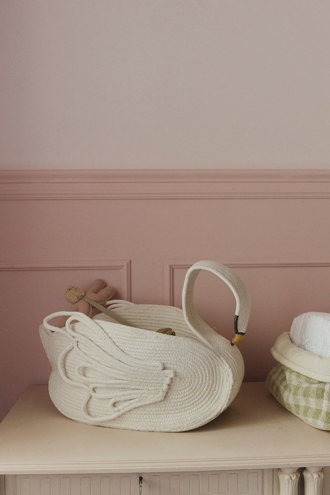 Lorena Canals Basket Swan storage basket styled in a children’s room