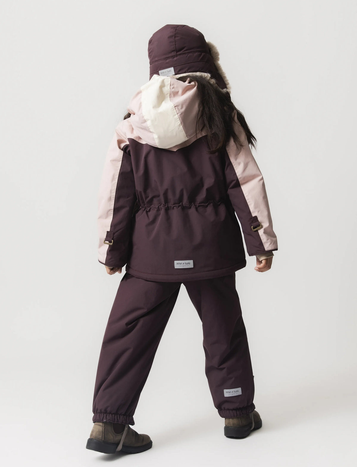 Child wearing MINI A TURE MATWALDO winter jacket, back view