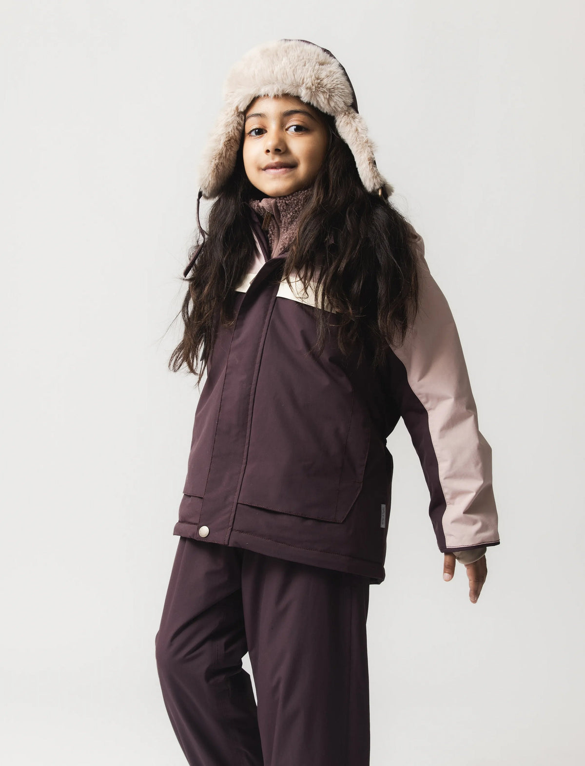 Child wearing MINI A TURE MATWALDO winter jacket, front view