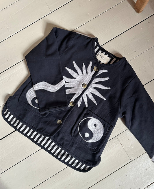 Sissel Mini Maggie Yin Yang jacket worn by a child